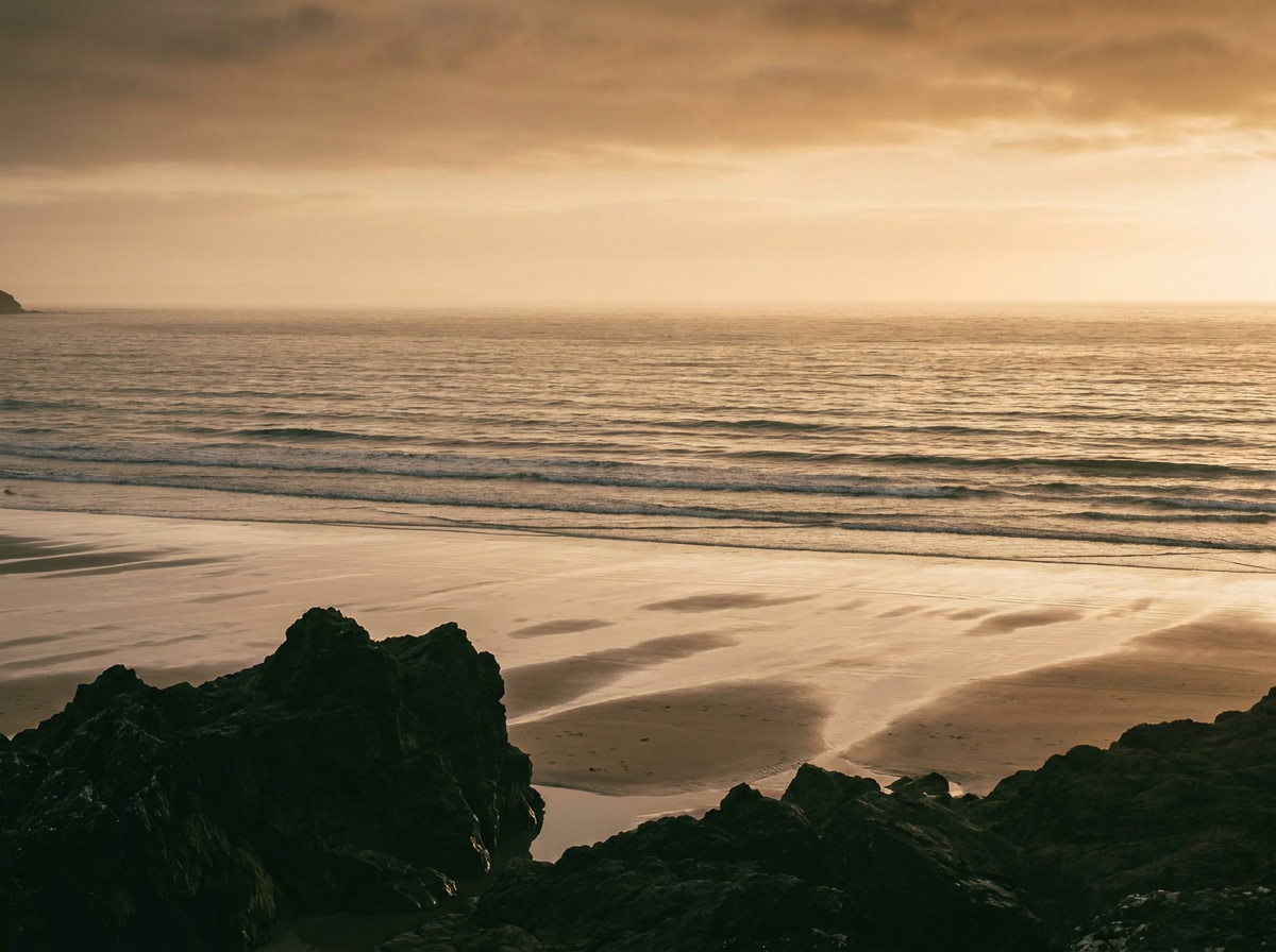 An empty beach at dusk